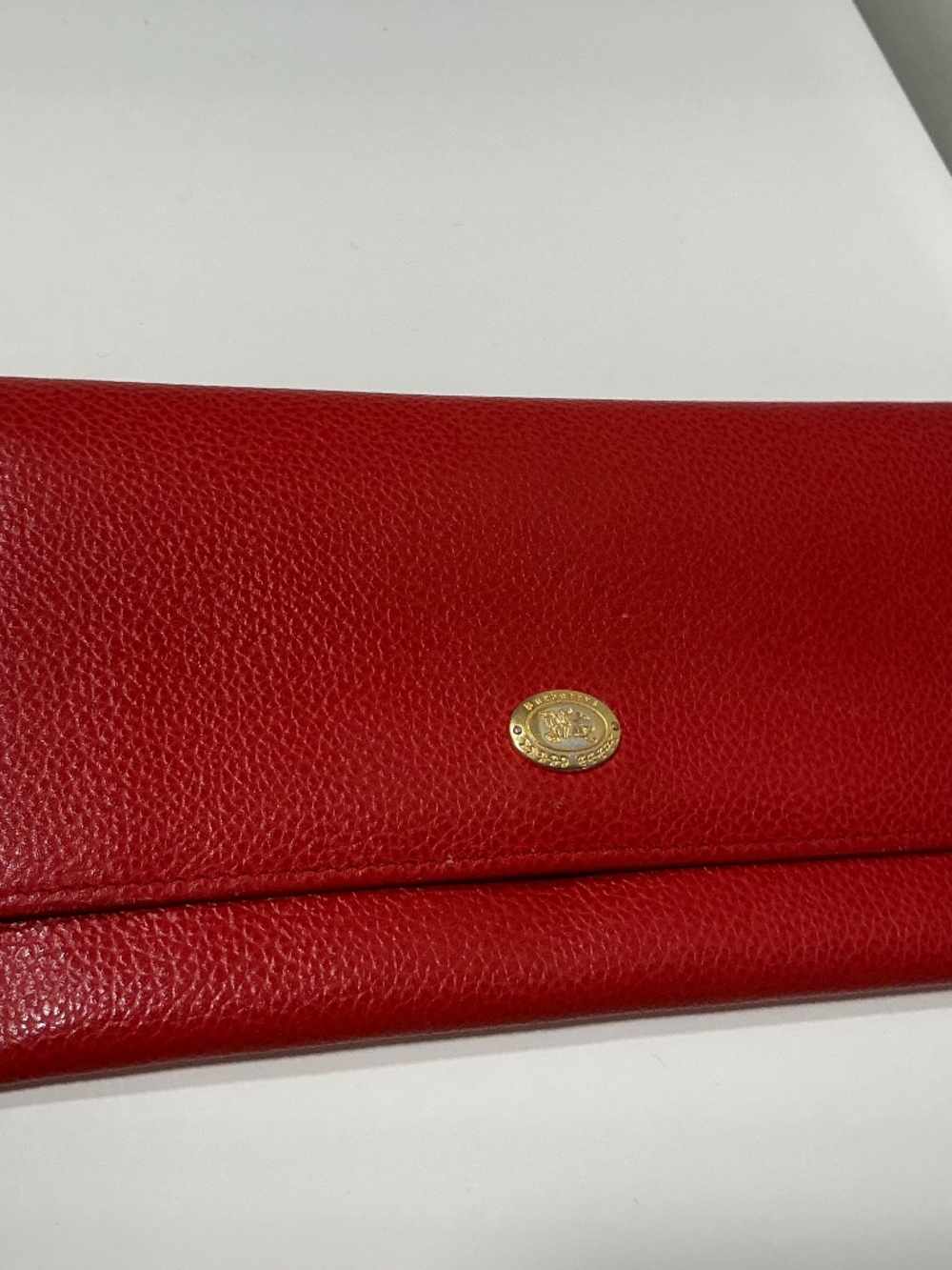 Vintage Burberrys red pebble leather clutch wallet